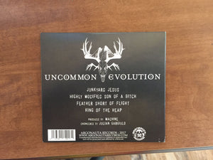 Uncommon Evolution - Junkyard Jesus back album cover