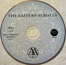 Charger l'image dans la galerie, Disc with 'The Eastern Scrolls' text and decorative patterns on a light background