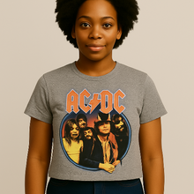 Cargar imagen en el visor de la galería, Person wearing a gray t-shirt with AC/DC graphic design on a beige background