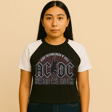 Charger l&#39;image dans la galerie, Person wearing a black and white AC/DC t-shirt on a beige background