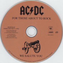 Load image into Gallery viewer, AC/DC photo of compact disc &#39;For Those About To Rock&#39; text of band name, album title and photo of a canon over a peach colored CD