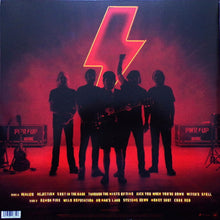 Cargar imagen en el visor de la galería, Silhouette of a band with a prominent lightning bolt symbol on a red background