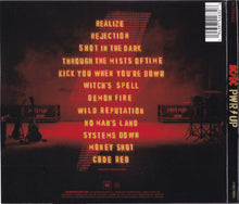 Charger l'image dans la galerie, Album cover with text and silhouette of a person against a red light