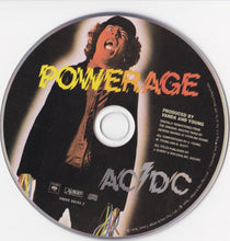 Cargar imagen en el visor de la galería, CD cover of AC/DC's 'Powerage' with a person in a black jacket and hat on a white background