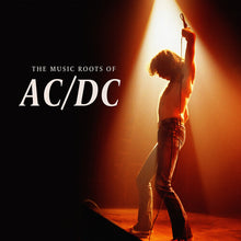 Cargar imagen en el visor de la galería, A vinyl record cover featuring a silhouette of a person, presumably a member of AC/DC, in a dynamic pose with a spotlight background. The text reads &#39;THE MUSIC ROOTS OF AC/DC&#39;.