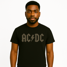 Cargar imagen en el visor de la galería, Person wearing a black AC/DC t-shirt on a white background