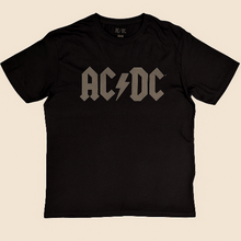 Charger l&#39;image dans la galerie, Black t-shirt with AC/DC logo on a beige background