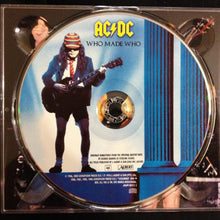 Charger l'image dans la galerie, CD cover of AC/DC's 'Who Made Who' with a person in a colorful hat playing guitar.