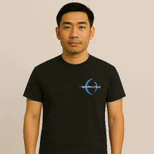 Charger l&#39;image dans la galerie, Man wearing a black t-shirt with a logo on a beige background