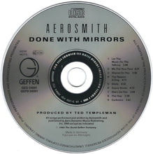 Charger l'image dans la galerie, CD disc of Aerosmith's 'Done with Mirrors' album with tracklist and production credits.