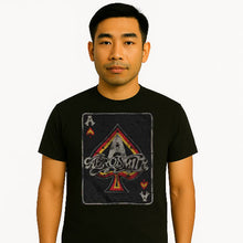 Cargar imagen en el visor de la galería, Person wearing a black t-shirt with a graphic design on a white background