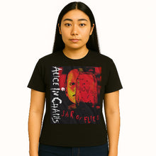 Load image into Gallery viewer, Person wearing a black t-shirt with &#39;Alice in Chains&#39; design