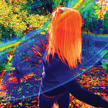 Load image into Gallery viewer, A person with long orange hair facing away from the camera, with a colorful, psychedelic background.