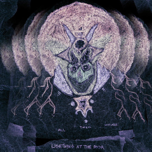 Alien-like creature with horns and a circular emblem on a dark background