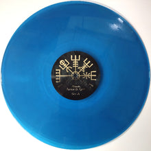Load image into Gallery viewer, Blue vinyl record with a black label featuring symbols on a white background