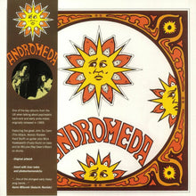 Cargar imagen en el visor de la galería, Album cover for 'Andromeda' with decorative sun design and text on a brown background