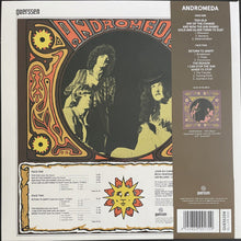 Cargar imagen en el visor de la galería, Album cover for 'Andromeda' with stylized text and images of people, featuring a decorative border.