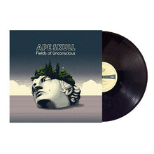 Load image into Gallery viewer, Vinyl record with a cover featuring an artistic depiction of a skull with greenery and the title 'Ape Skull: Fields of Unconscious'.