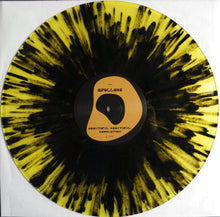 Cargar imagen en el visor de la galería, Vinyl record with yellow and black splatter design on a white background