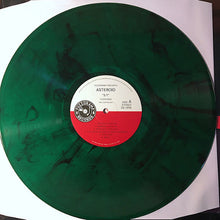 Cargar imagen en el visor de la galería, Green vinyl record with a white and red label on a white background