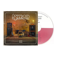 Charger l'image dans la galerie, Asteroid III CD album with its illustrated jewel case and a partially visible pink-and-white CD on a plain white background.