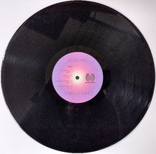 Cargar imagen en el visor de la galería, Vinyl record with a purple label on a white background