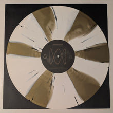 Charger l'image dans la galerie, Vinyl record with a gold and white design on a black border