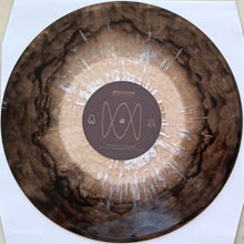 Charger l'image dans la galerie, Vinyl record with a unique design on a white background