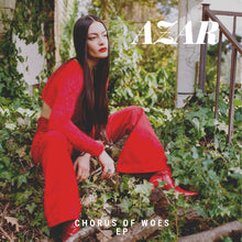 Cargar imagen en el visor de la galería, Person in red outfit sitting among greenery with 'AZAR' album cover text.