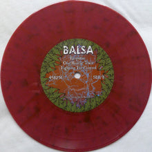 Load image into Gallery viewer, Red vinyl record with a label featuring text and graphics on a white background