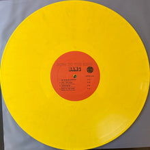 Load image into Gallery viewer, Yellow vinyl record with a red label on a gray background