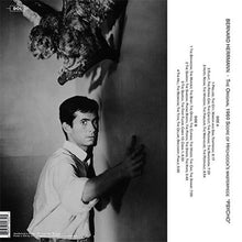 Charger l'image dans la galerie, Black and white album cover with a person leaning against a wall, featuring text on the right side.