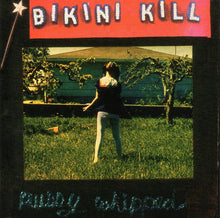Load image into Gallery viewer, Album cover with 'Bikini Kill' at the top, showing a person in a garden.