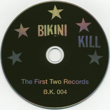 Cargar imagen en el visor de la galería, CD with 'Bikini Kill' branding and star designs on a black background