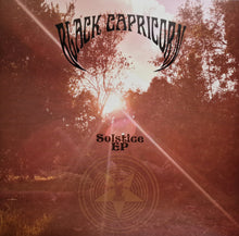 Cargar imagen en el visor de la galería, Album cover for 'Black Capricorn Solstice EP' with a sunset over trees and star design.