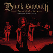 Charger l'image dans la galerie, Cover artwork for Black Sabbath vinyl record featuring the band performing on stage with lead vocalist in the foreground and musicians in the background, with a red hue over the image.