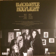 Load image into Gallery viewer, Album cover with text 'Blackwater Holylight' and a black and white photo of four people.