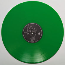 Cargar imagen en el visor de la galería, Green vinyl record with a label on a white background