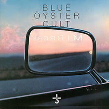 Charger l'image dans la galerie, The product image features the cover art for the Blue Oyster Cult album 'Mirrors'. The artwork displays a rearview mirror reflecting a sunset, with the band's name 'Blue Oyster Cult' prominently shown above the mirror.
