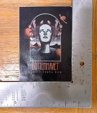 Charger l'image dans la galerie, Album cover with artistic design and text, placed on a wooden surface with a ruler for scale.
