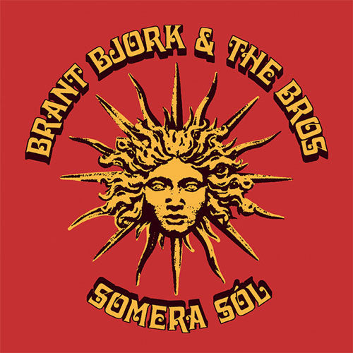 Logo with sun design and text 'Brant Bjork & The Bros Somera Sol' on a red background