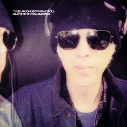 Album cover with a person wearing sunglasses and a beanie, with text at the top.