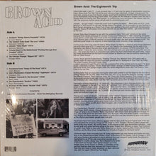 Cargar imagen en el visor de la galería, Back cover of a vinyl record with text and black and white photos.