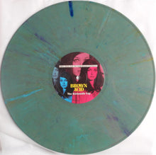 Load image into Gallery viewer, Vinyl record with a colorful label featuring faces and text on a white background