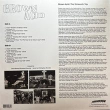 Load image into Gallery viewer, Back cover of a vinyl record with text and black and white photos.
