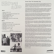 Charger l'image dans la galerie, Back cover of a music album titled 'Brown Acid: The Twentieth Trip' with text and black and white photos.