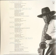 Load image into Gallery viewer, Album cover with saxophonist and track list on a white background