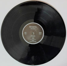 Cargar imagen en el visor de la galería, Budgie - Impeckable black vinyl record.