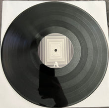 Cargar imagen en el visor de la galería, Vinyl record with label on white background