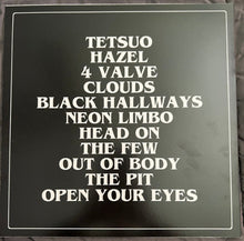 Cargar imagen en el visor de la galería, Black album cover with white text listing song titles.